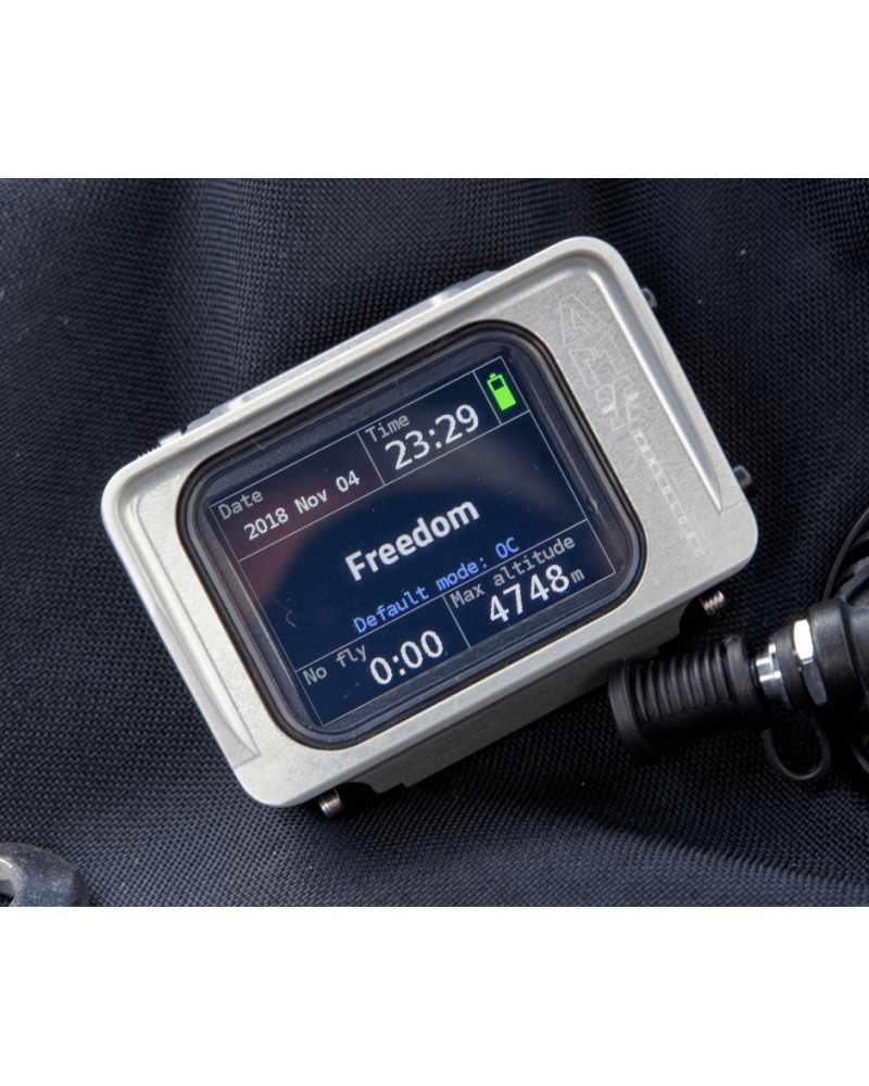 Dive computer showing Freedom and altitude.