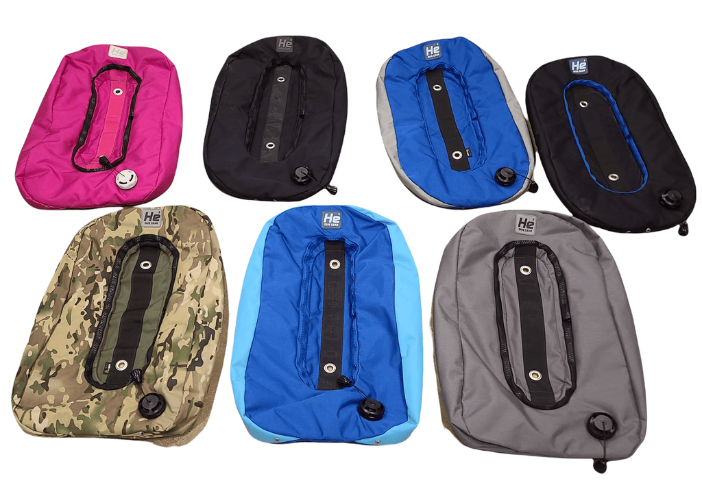 Assortment of colorful scuba diving BCDs