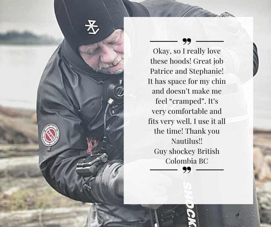 Scuba diver in hood, reviewing Nautilus product.